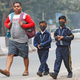 School kids geared up for the day on a smoggy Nov. 7 morning.